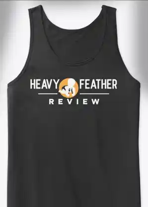 A picture of Heavy Feather Review logo on a tank top